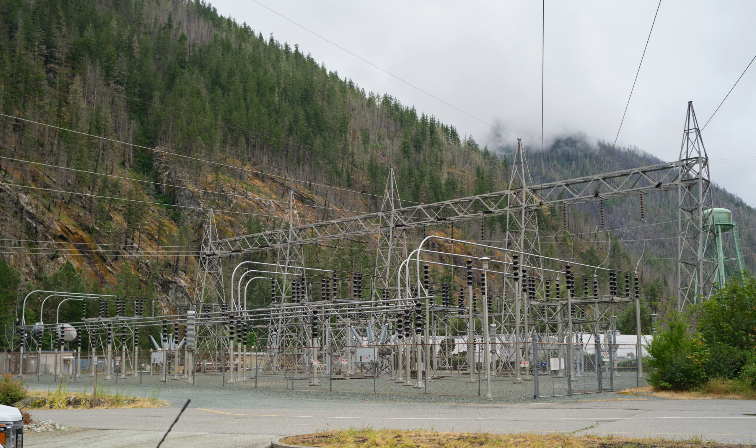 View of an electrical substation and power grid infrastructure supporting energy-intensive facilities amid rising electricity costs.